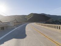 Mountain Road: Asphalt Underneath a Clear Sky