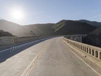 Mountain Road: Asphalt Underneath a Clear Sky