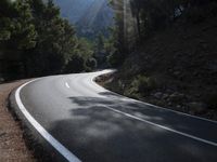 Mountain Road Through Asphalt Highland Landscape
