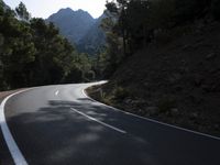 Mountain Road Through Asphalt Highland Landscape