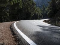 Mountain Road Through Asphalt Highland Landscape