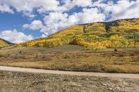 Mountain Road: Autumn Landscape with Rugged Hills