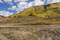 Mountain Road: Autumn Landscape with Rugged Hills