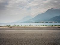 Mountain Road Overlooking Lake: Parking Lot in Italy