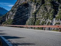 Mountain Road View in Italy - Scenic Landscape with Contrails