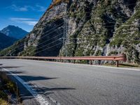 Mountain Road View in Italy - Scenic Landscape with Contrails