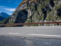 Mountain Road View in Italy - Scenic Landscape with Contrails