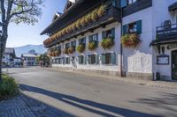 the town square is located around this old building and offers great privacy and shade for tourists