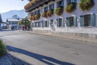 the town square is located around this old building and offers great privacy and shade for tourists