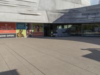 there is an entrance to a museum in the building where they are studying students there