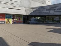 there is an entrance to a museum in the building where they are studying students there