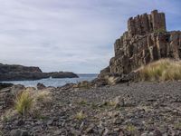 Nature's Highland: Rocky Terrain and Cloudy Skies