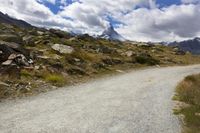 Nature's Glory: Mountain Road in Switzerland Surrounded by Clouds