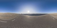 two cars going down the middle of a road near some sand dunes in a 3d world