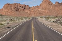 Nevada Desert Road: Asphalt Cutting Through Red Rocks