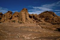the desert in nevada features many rock formations and arid terrains with various species in the area