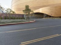 a building with a curved top that looks like something in a big city or town