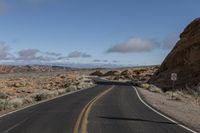 Nevada, USA - Asphalt Road and Desert Landscape