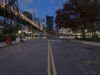 New York City Night Skyline with Bridge
