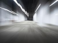 the view of an empty subway station from the sidelines of the station as it is zoomed in