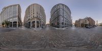 there is a street scene with three fisheye lens pictures of the intersection of two buildings