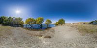 this is an amazing panoramic image of a lake near a campground on the edge of the water