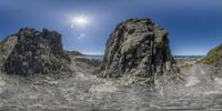 the view of the mountains with water around them from 360 viewing glasses that shows a wave coming up from beneath