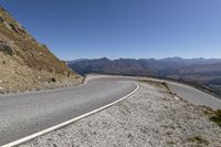 New Zealand Mountain Pass: Clear Sky and Majestic Mountains