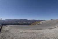 New Zealand's Mountain Pass Road: A Clear Sky Journey