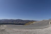 New Zealand's Mountain Pass Road: A Clear Sky Journey