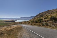 New Zealand Mountain Road under Clear Sky