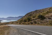 New Zealand Mountain Road under Clear Sky