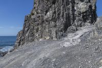 New Zealand Mountains, Ocean, and Rocky Outcrops