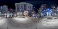 the panorama photo was taken in a series of photos at night, the street and buildings have been lit up