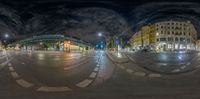 a view through a fish eye lens of a street at night, from the ground level