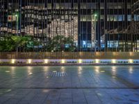 Night View of Berlin's Cityscape: Neon Lights and Plaza