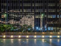 Night View of Berlin's Cityscape: Neon Lights and Plaza