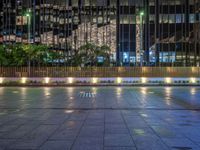 Night View of Berlin's Cityscape: Neon Lights and Plaza