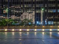 Night View of Berlin's Cityscape: Neon Lights and Plaza