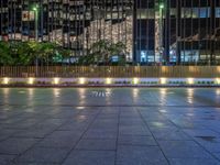 Night View of Berlin's Cityscape: Neon Lights and Plaza