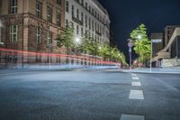 an image of a busy city street at night time in europe's capital city