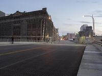 a metal grate is shown at night on the sidewalk in this city street scene