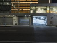 Night cityscape with illuminated buildings and roads