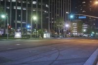 the city is lit up at night with street lights and no traffic signs on them