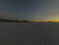 Night Desert with Salt Lake Reflecting Stars