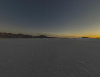 Night Desert with Salt Lake Reflecting Stars