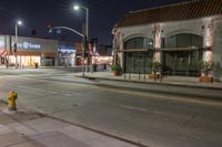 an image of the night time in town and street corner area with no people around