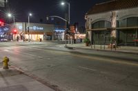 an image of the night time in town and street corner area with no people around