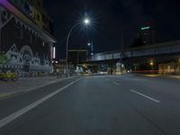 Night Scene of Berlin City with Street Lights and Graffiti