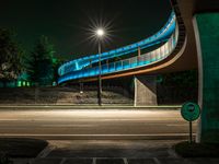 Night scene of the city under a low bridge in California